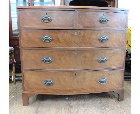 A George III Mahogany Bow Front Chest of Drawers. Fitted with two short and three long graduated drawers. On bracket feet.App
