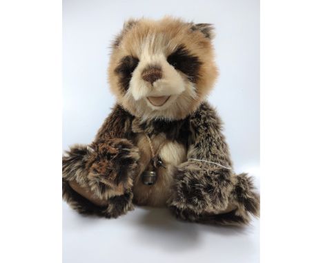 Charlie Bear Anniversary Woody.  30cm. A coat of cream and brown plush, with warm tones and light tipping. Complete with bell