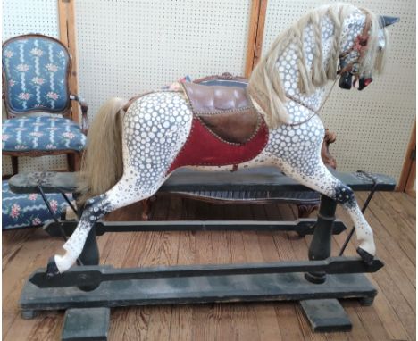 A Vintage White Rocking Horse. With some restorations. Approx. 98cm to seat 126cm to head, 157cm length 