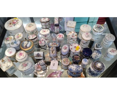 A selection of porcelain lidded circular and oval boxes, including Lysander, Ayshford and Royal Worcester. (37) 