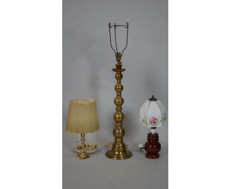 A tall brass table lamp base along with a smaller example with shade and a vintage brown glazed lamp. H.64cm (Tallest) 