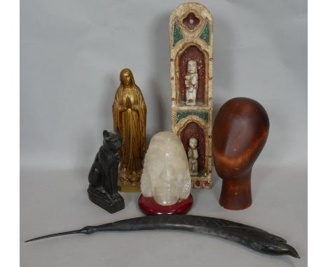 A collection of decorative items. Including a gilded spelter figure of the Virgin Mary, a resin Egyptian cat statue, a carved