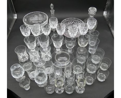 An extensive collection of glass to include cut crystal, drinking glasses, decanters, comports, wine glasses and bowls. Some 