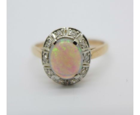 An 18ct gold, platinum, opal and diamond cluster ring, 3.2g, P