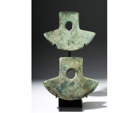 Pre-Columbian, Peru, Inca Empire, ca. 1470 to 1532 CE. A pair of elegant axe heads, solid-cast from copper, with large cylind