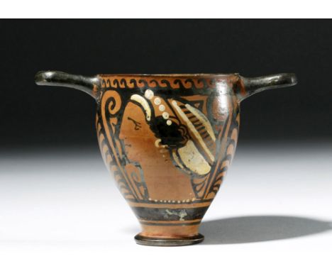 Magna Graecia, South Italy, Apulian, ca. 350 to 320 BCE. A fine red-figure skyphos with added/fugitive white and yellow paint