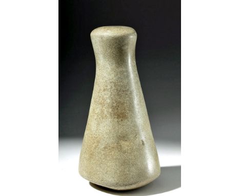 South Pacific, Polynesia or Hawaii, ca. 19th century CE. Made of a smoothed grey-green basalt, with a rounded base and a slig