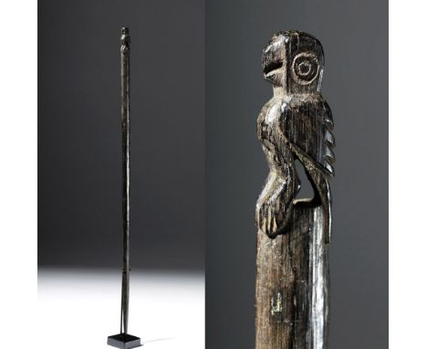 Pre-Columbian, Peru, Chimu, ca. 1000 to 1200 CE. An elegant loom stick carved from a hard wood, adorned with a perched bird a