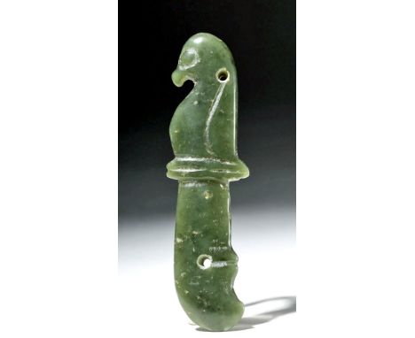 China, Qing (Ching) Dynasty, ca. 1644 to 1912 CE. A beautiful jade knife in the form of a bird in profile, hand-carved from a