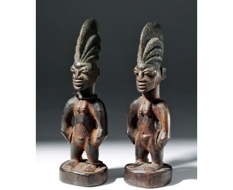 West Africa, Yoruba culture, Ibeji, ca. early 20th c. CE. A matching pair of deceased female twin figures, known as Ibeji, mo