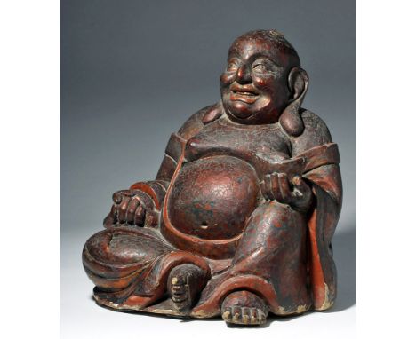 China, South Fujian Province, late 19th to early 20th century CE. A well-carved Happy Buddha (Ho Tai in Chinese) statue inten