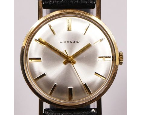 Garrard, a 9ct gold manual wind presentation gentleman's wristwatch, dated 1973, original case. Winds, sets and is ticking. 