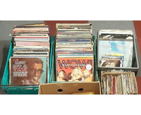 A substantial collection of vinyl LPs, 12" singles and singles, mostly mainly 50s and 60s, to include artists such as Elvis, 