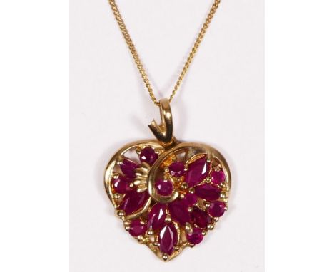 A 9ct gold and ruby set heart pendant, 15 x 15mm, chain, 3.3gm. 