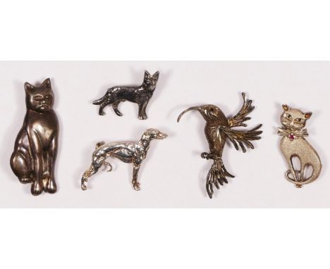 A sterling silver dog brooch in the form of a whippet, another of a German Shepard, a hummingbird and two cats, 29gm 