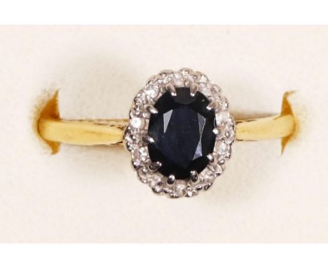 An 18ct gold sapphire and diamond cluster ring, O, 2.5gm 