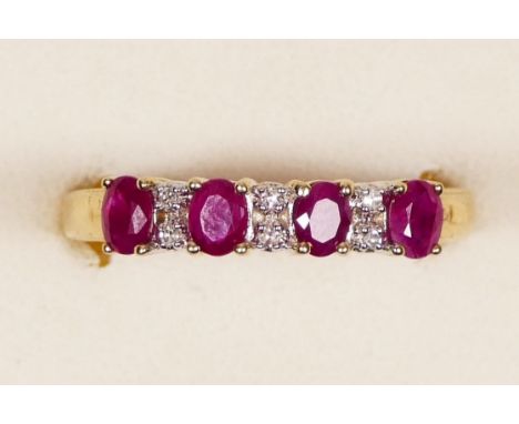 A 9ct gold ruby and diamond ring, S, 2.6gm 