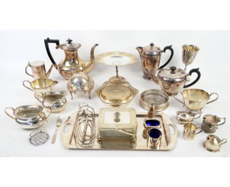 Large group of silver-plated items including two cased flatware sets, tea-service, sauce boats, tazza, etc. .     