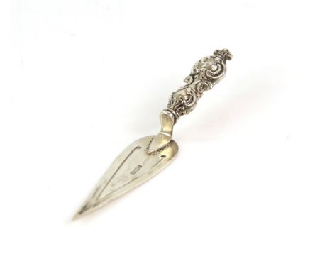 Silver bookmark in the form of a trowel with scrolled handle, Birmingham 1899.     