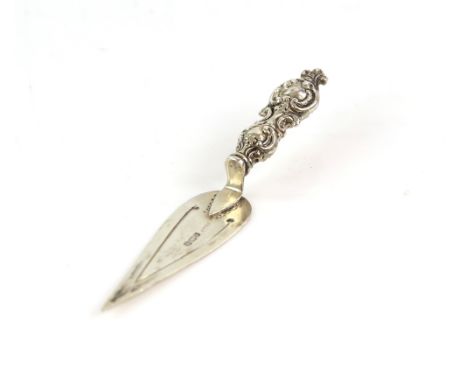 Silver bookmark in the form of a trowel with scrolled handle, Birmingham 1899.     