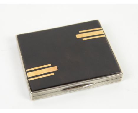 White metal and tortoiseshell cigarette case with engine turned decoration, 8cm wide,.     
