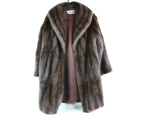 Victor Fox of London brown Mink coat  another by Maurice Furriers, .     