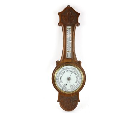 20th century carved oak barometer..     