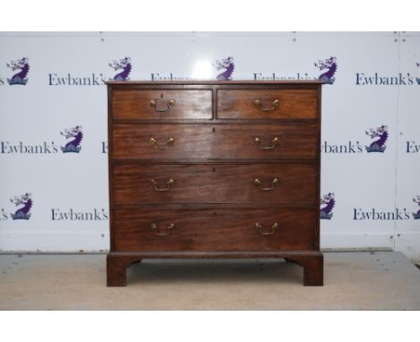 19th century mahogany straight front chest of two short over three long graduated drawers to bracket base,.     