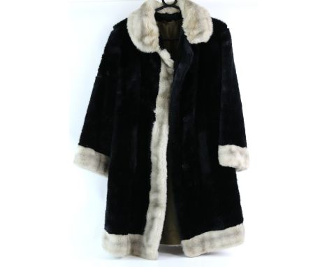 Harrods of London blond faux fur coat another two one in black with white trim  .     