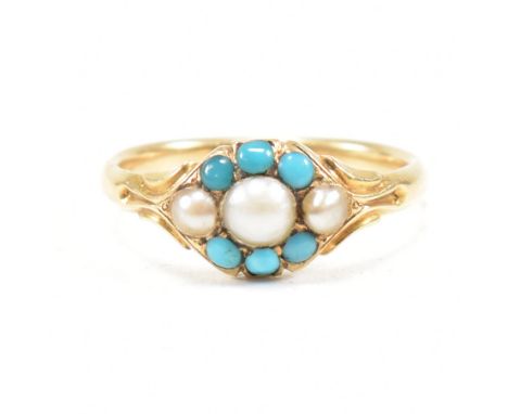 A 19th century gold seed pearl and turquoise cluster ring. The ring set with three central seed pearls within a halo of turqu