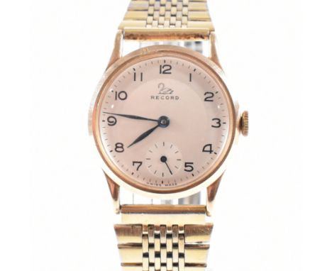 A vintage hallmarked 9ct yellow gold cased Record wristwatch. The Swiss made watch having a circular silvered dial with black