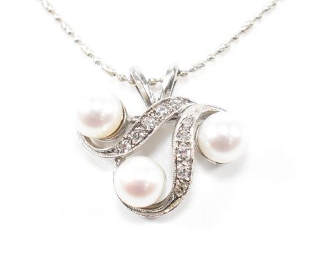 A white gold pearl and diamond pendant necklace. The necklace strung with a pearl and diamond set pendant suspended on an 18c