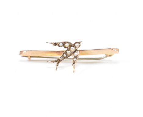 An early 20th century 9ct gold and pearl swallow bar brooch pin. Stamped S 9ct. Measures approx 4.5cm in length. Weight appro