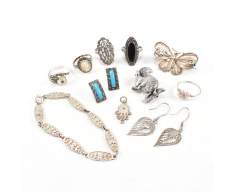 A collection of 925 silver and white metal filigree and marcasite set jewellery. The lot to include a bracelet, stud earrings