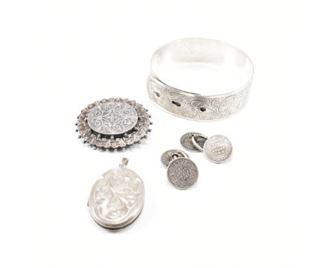 A collection of antique silver and white metal jewellery. The lot to include a hinged locket pendant, a pair of Indian Two An