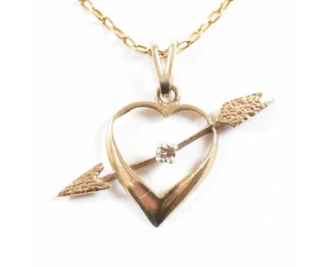 A 9ct gold and diamond heart pendant necklace. The necklace strung with a heart and arrow pendant set with a single diamond, 