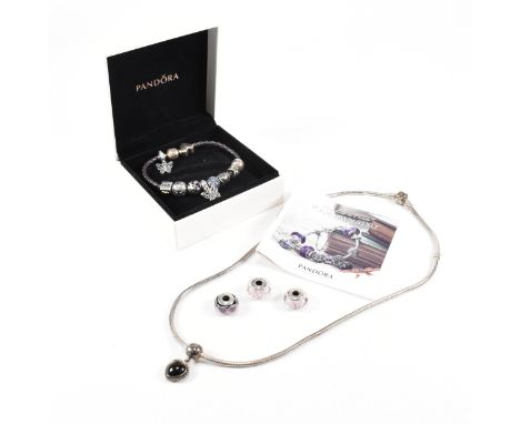 A Pandora silver charm bracelet and silver charm necklace. The bracelet strung with butterflies and enamel and '21', I love y