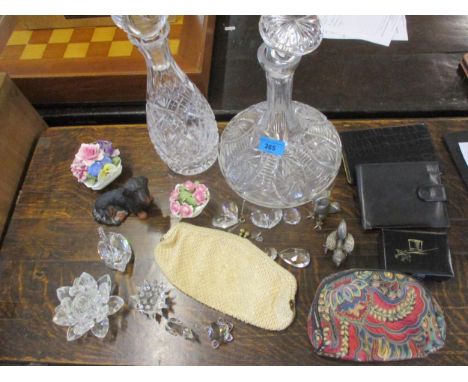 A mixed lot comprising two cut glass decanters, Swarovski crystal models, two pewter models of cockerels, vintage purses and 