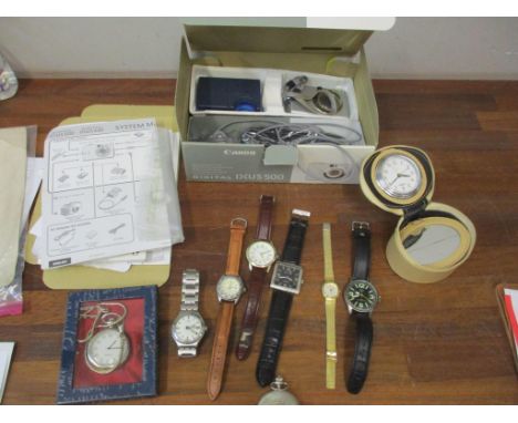 A selection of modern wristwatches and pocket watches to include a 1988 Swatch watch, along with a boxed Canon Digital IXUS 5
