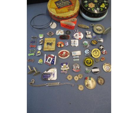 A quantity of vintage motorcycle badges to include 1960's enamelled examples covering TT and IOM events, 1980's Racing events