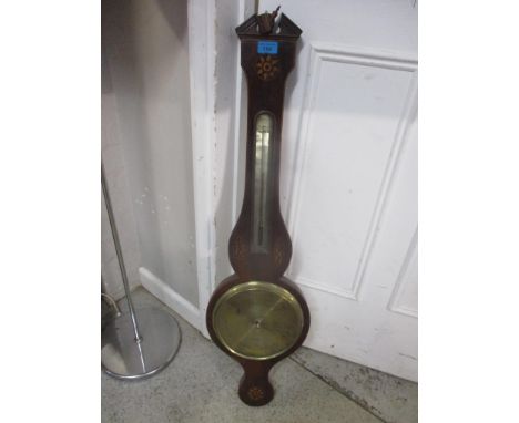 A 19th century mahogany and marquetry wheel barometer with a thermometer and brass dial inscribed Ortelli &amp; Co 