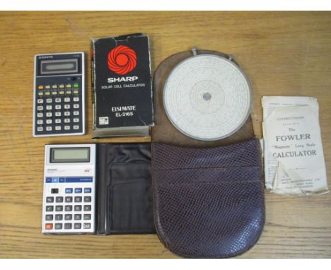 The Fowler 'Magnum' long scale calculator in original leather case with instructions leaflet, along with a Casio electronic c