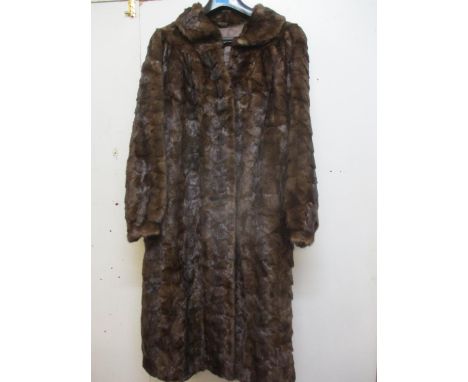 A Saga Scandinavian brown mink coat, purchased from Greece in the 1980's, 40" chest x 42" long, with matching hat together wi