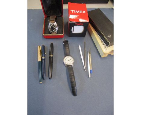 A WWII Ingersoll Victory wristwatch with leather strap and a gents Timex wristwatch together with Parker pens including a fou