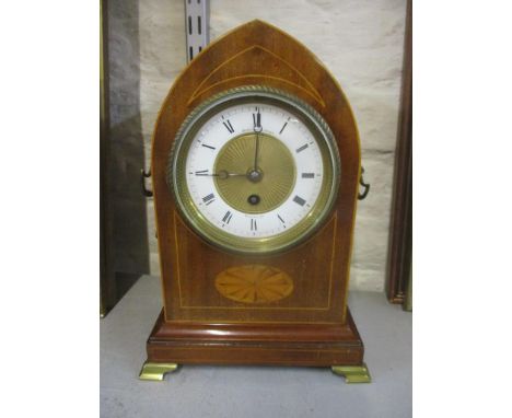 An Edwardian mantel clock having marquetry inlaid, twin carrying handles, machine turned centre, the dial signed Hamilton &am