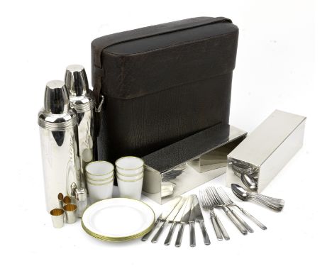 An interesting shoulder-carried picnic set for six persons, pre-War,black textured leather case with lid and shoulder strap w