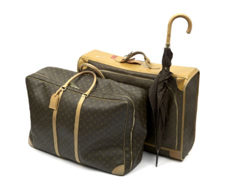 Two Louis Vuitton cases and an umbrella, late 20th Century,both zip-fastening soft-sided cases with monogram pattern, the fir