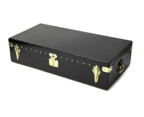 A Louis Vuitton motoring trunk, circa 1910,black Vuittonite exterior, with central brass lock and two catches, with brass loo