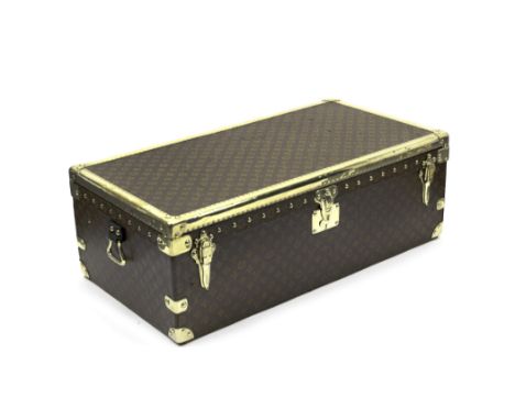 A Louis Vuitton motoring trunk, circa 1920,printed monogram canvas exterior, with polished brass edging, central brass lock a