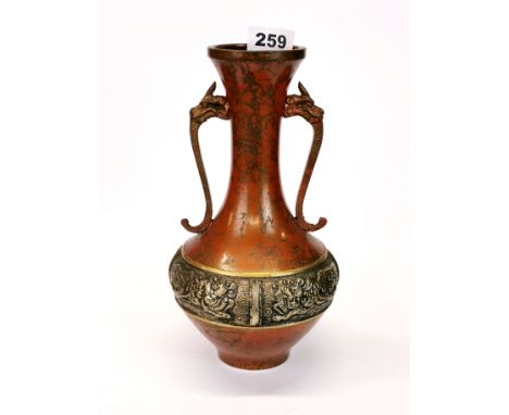 An Oriental lacquered and silvered bronze vase with dragon head handles, c. 1930's, H. 34cm.